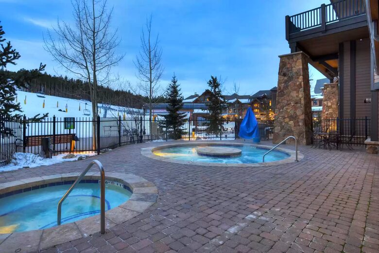 Hot tubs adjacent to fitness center and sauna