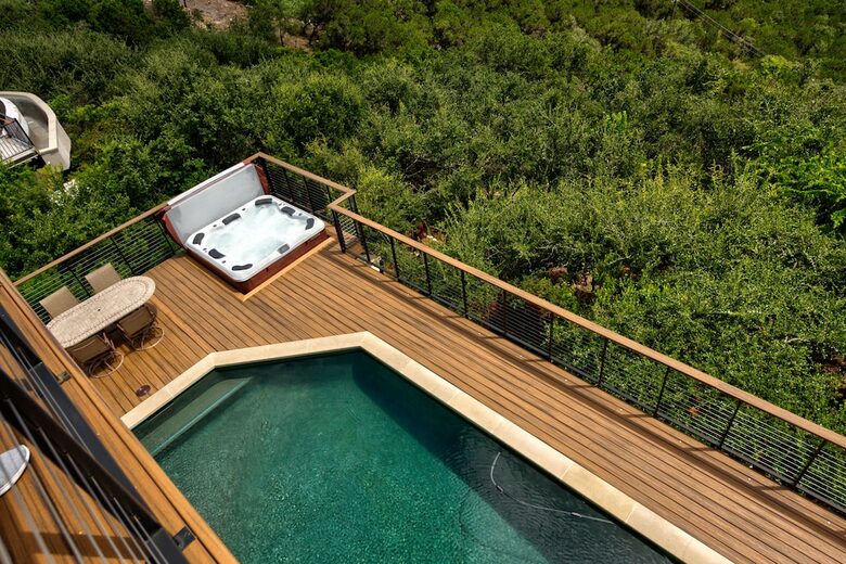 Home Exchange in Austin, TX pool and hot tub view from the upper deck