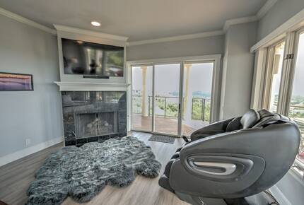 Home Exchange in Austin, TX master suite fireplace, tv, and massager