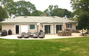 Back of house with dining, lounge and fire pit