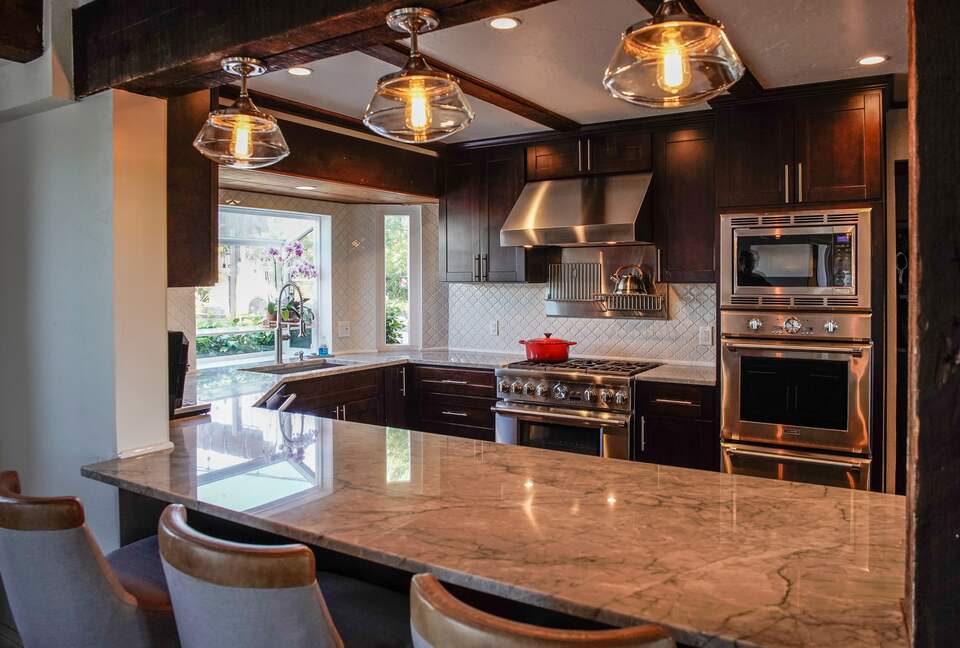 Home Exchange in Napa, CA chefs kitchen with counter seating