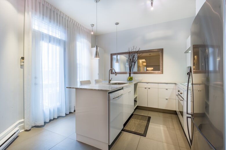 Home Exchange in Montreal, Quebec kitchen with updated appliances