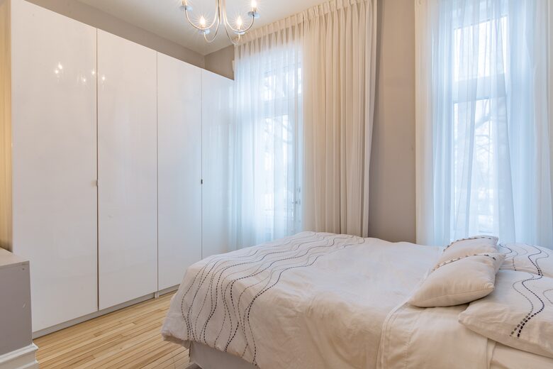 Home Exchange in Montreal, Quebec bedroom one with storage