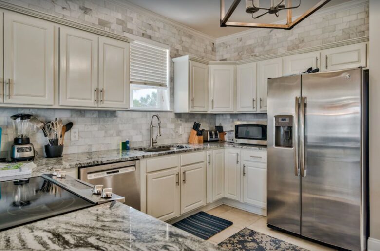 Kitchen with granite countertops and eat-in bar
