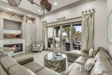 Home Exchange in Destin, FL living room with fireplace