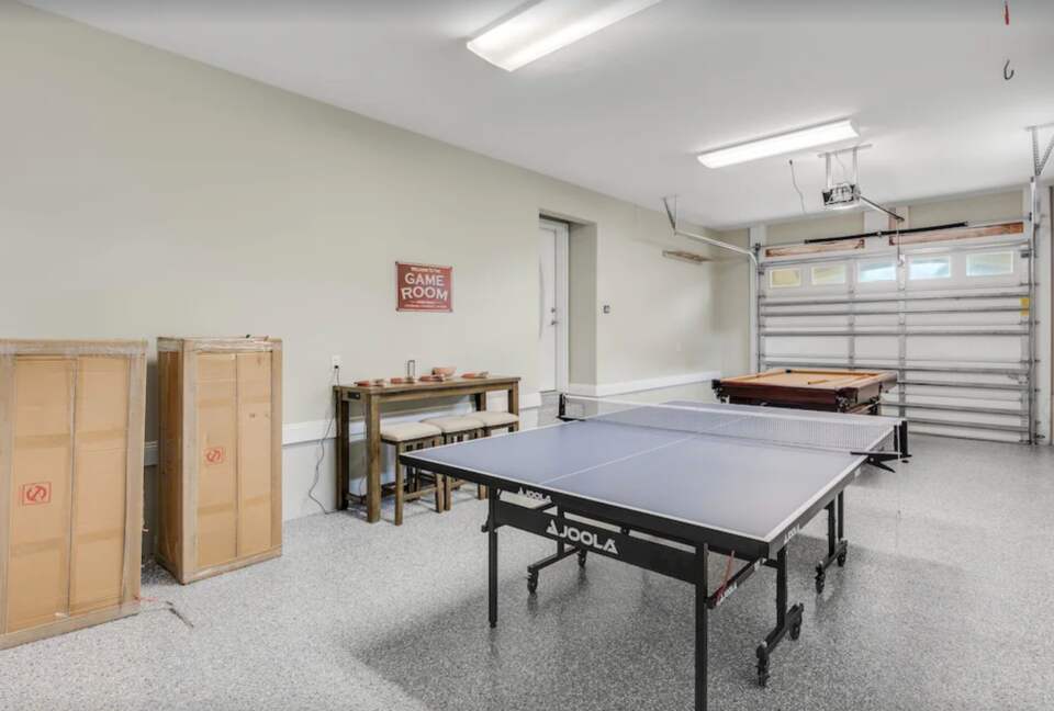 Game room with pool table and ping pong