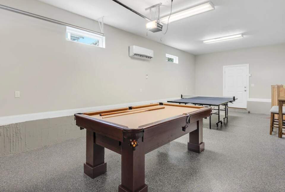 Game room with pool table and ping pong