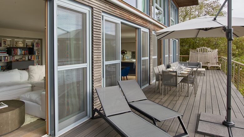 Terrace with sun loungers, bbq, table for 10 and sofa area