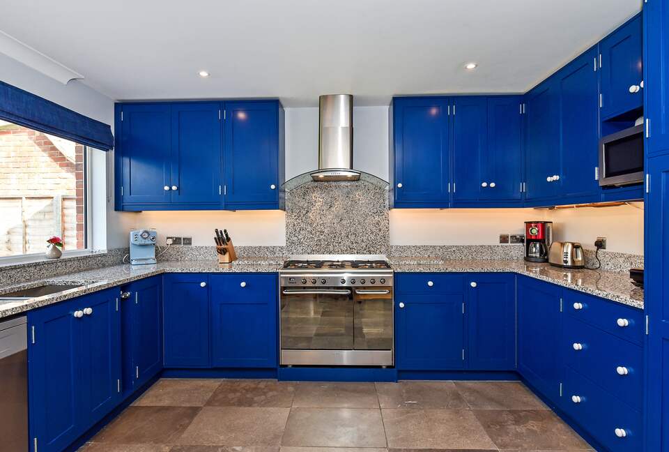 Smeg 5 burner stove with double oven. Granite work tops.