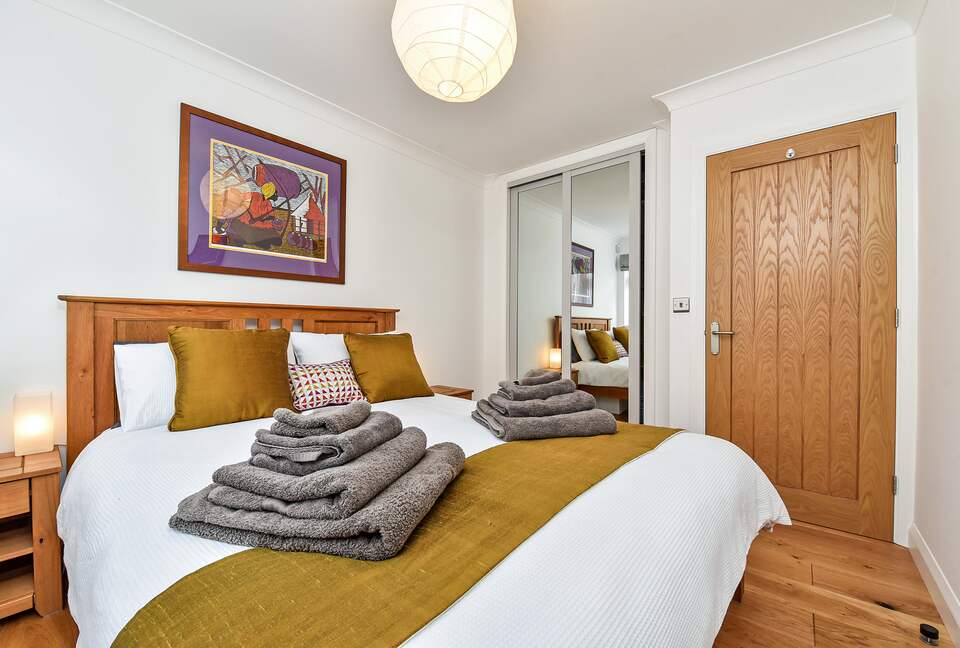 Bedroom 3. King sized bed. Built in wardrobe.