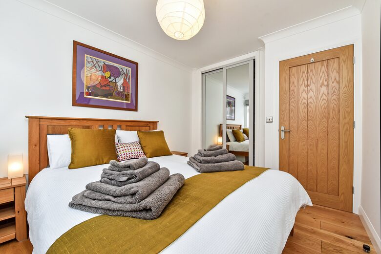 Bedroom 3. King sized bed. Built in wardrobe.