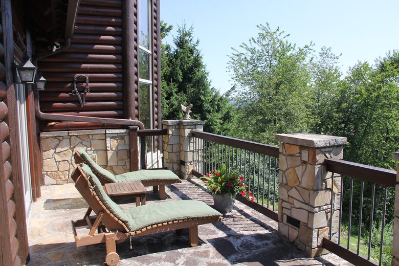 Outdoor patio overlooking lake; outdoor Solostove firepit