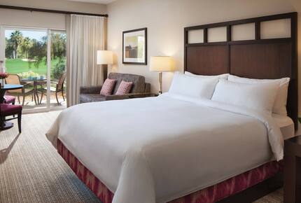 Home Exchange in Pam Desert, CA master suite with pull out sofa