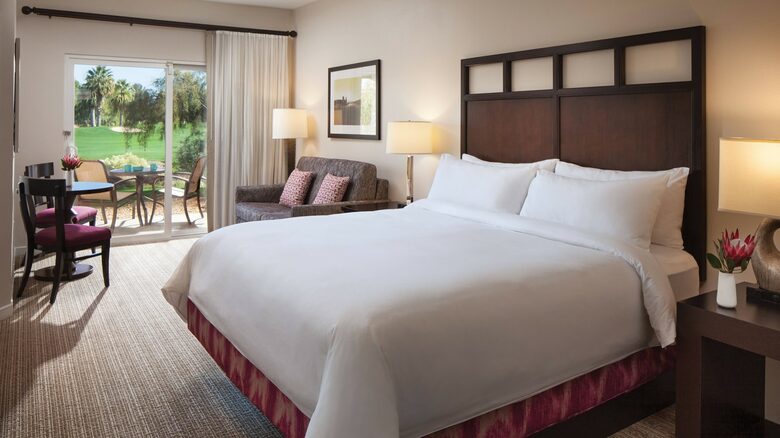 Home Exchange in Pam Desert, CA master suite with pull out sofa