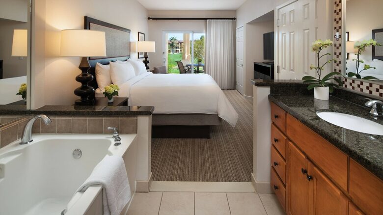 Home Exchange in Pam Desert, CA bedroom with tub