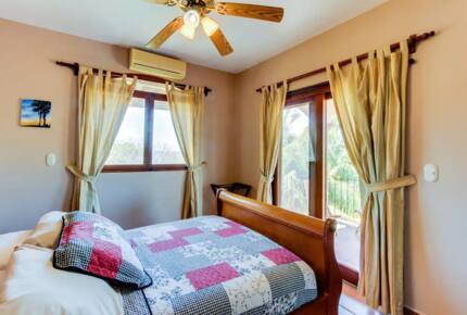 Home Exchange in Tola, Rivas, Nicaragua bedroom with patio access