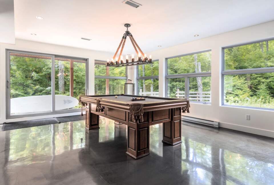 Lower level bar, pool table and den