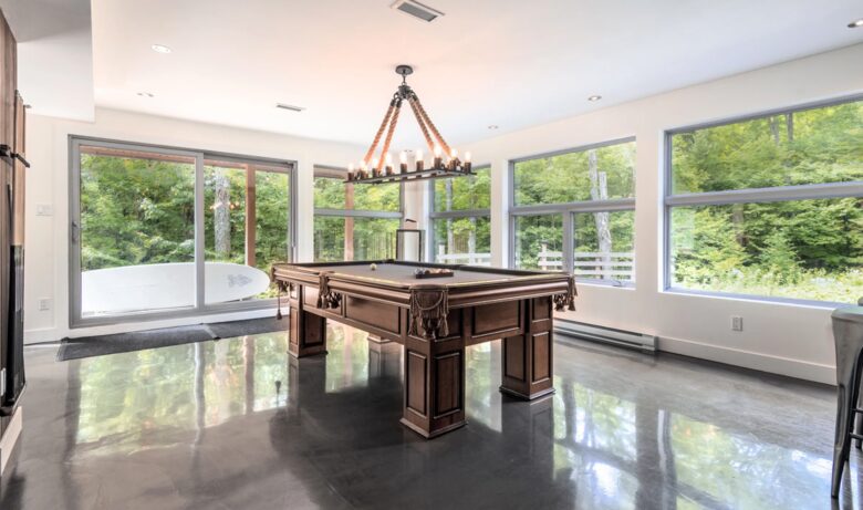 Lower level bar, pool table and den