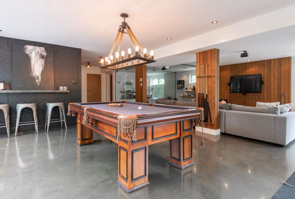 Lower level bar, pool table and den