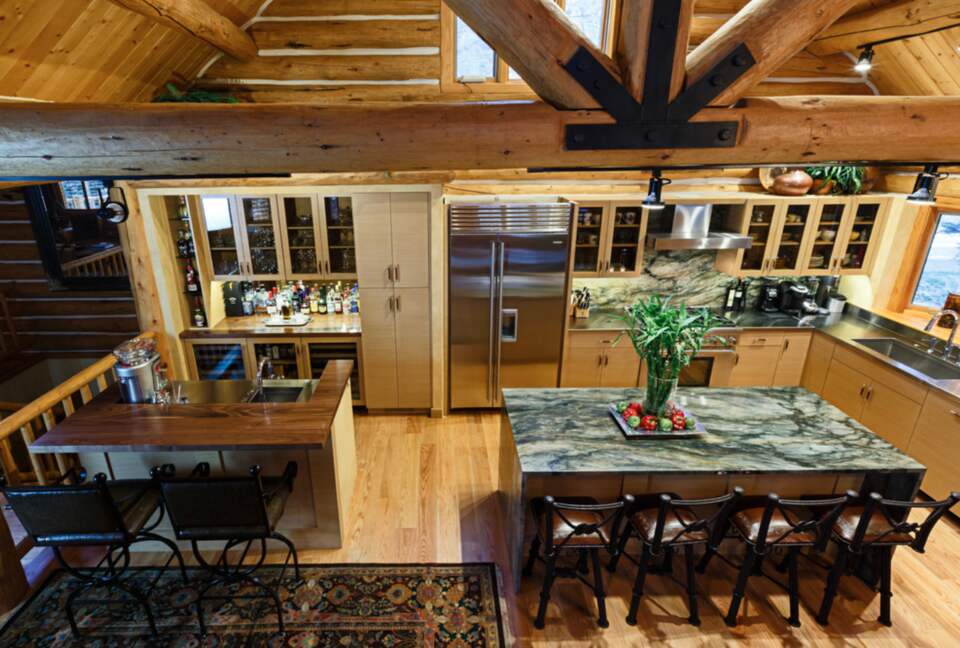 Updated kitchen with spacious island and bar