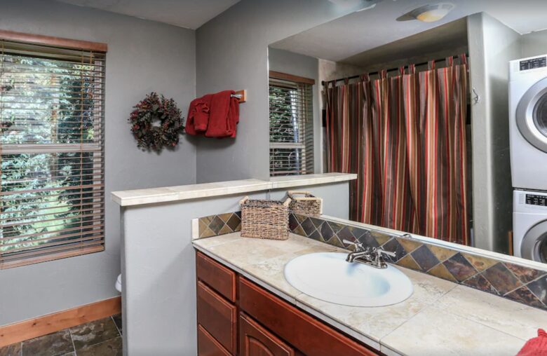 Top level bathroom next to queen bedroom