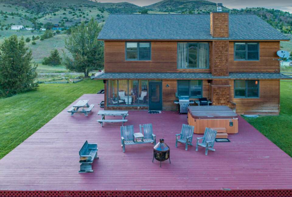 Back patio with grill, fire pit and hot tub