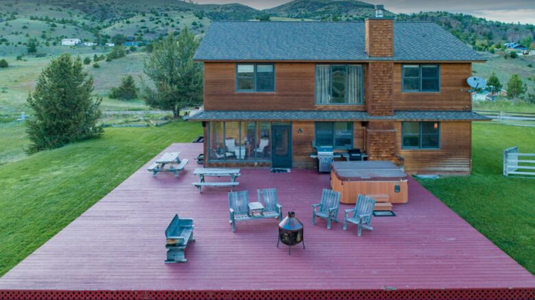 Back patio with grill, fire pit and hot tub