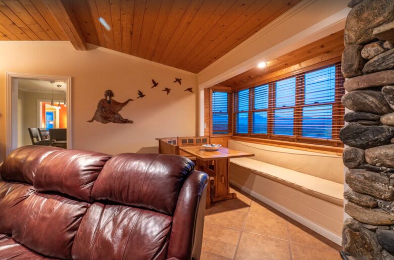 Open living room with fireplace and bench seating