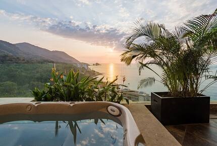 Jacuzzi on terrace with Ocean and Mountain views