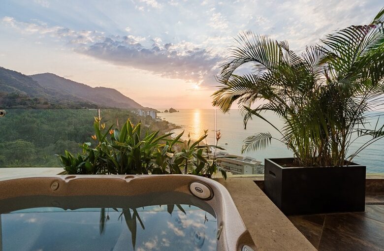 Jacuzzi on terrace with Ocean and Mountain views