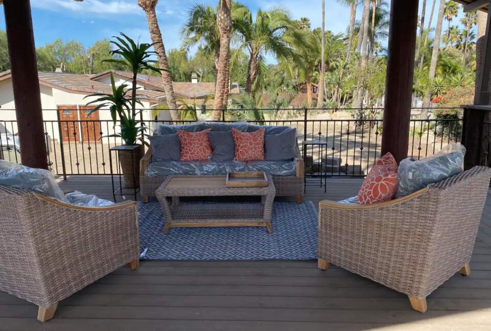 Back deck overlooking tennis court