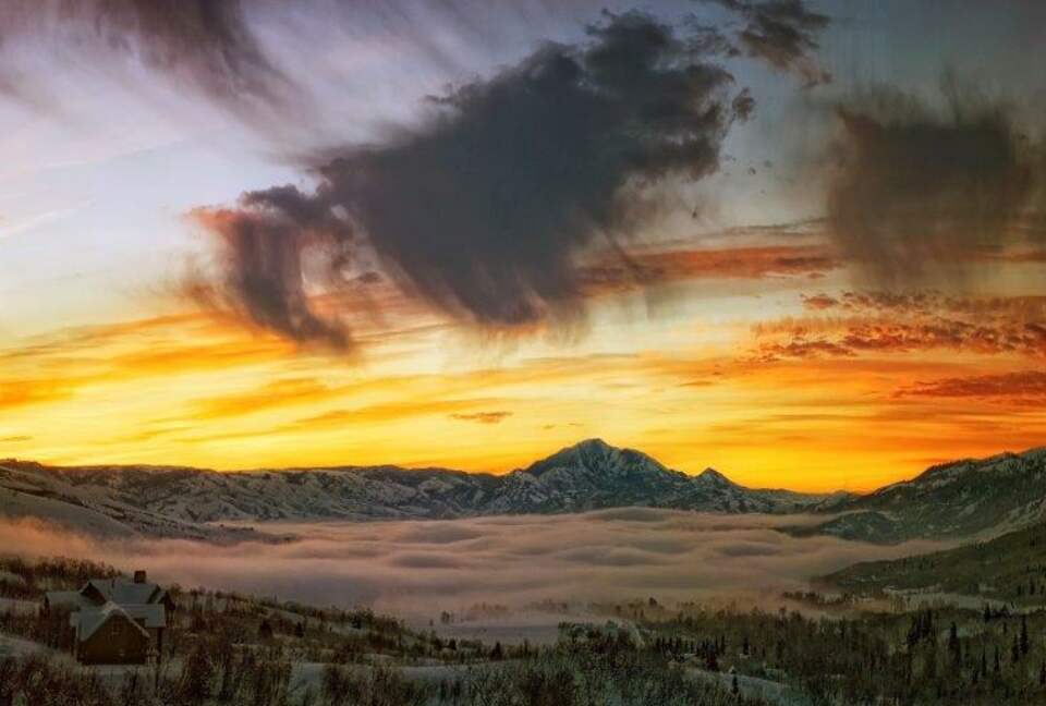 Home Exchange in Eden, UT valley view covered in fog