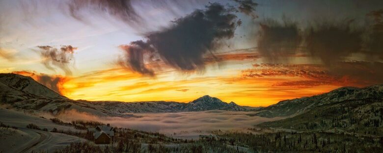 Home Exchange in Eden, UT valley view covered in fog