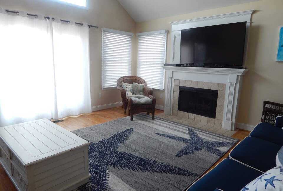 Home Exchange in Sea Isle City, NJ fireplace and large flat screen