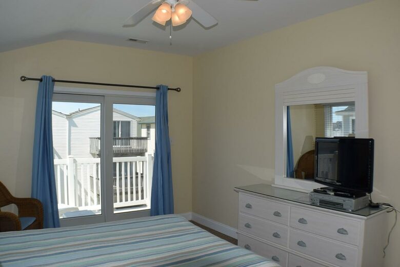 Home Exchange in Sea Isle City, NJ master bedroom with patio access