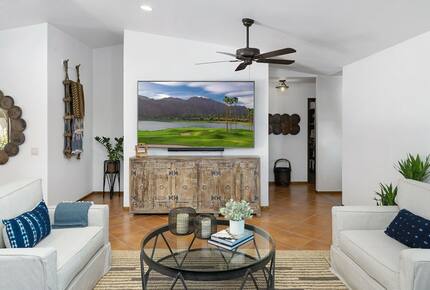 Home Exchange in La Quinta, CA family room with large television