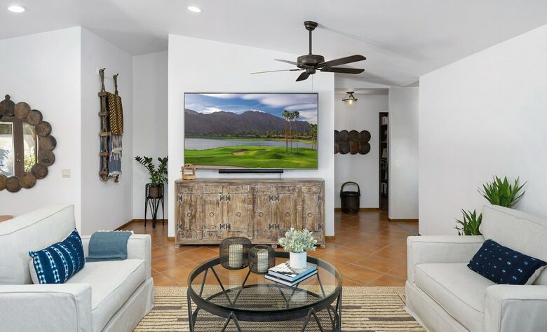 Home Exchange in La Quinta, CA family room with large television
