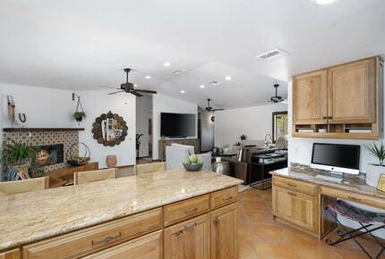 Home Exchange in La Quinta, CA kitchen with desktop