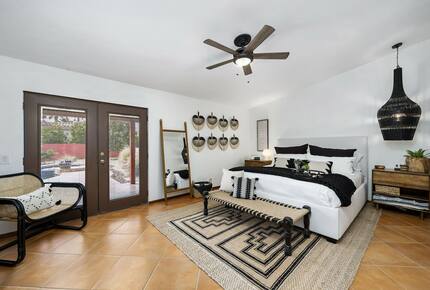 Home Exchange in La Quinta, CA master bedroom with en suite