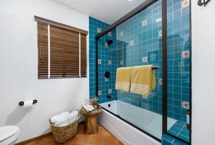 Home Exchange in La Quinta, CA bathroom 2 with shoer tub combo