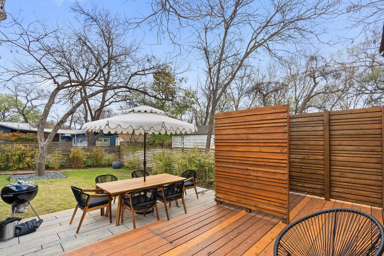 Back patio with grill, dining, and lounge