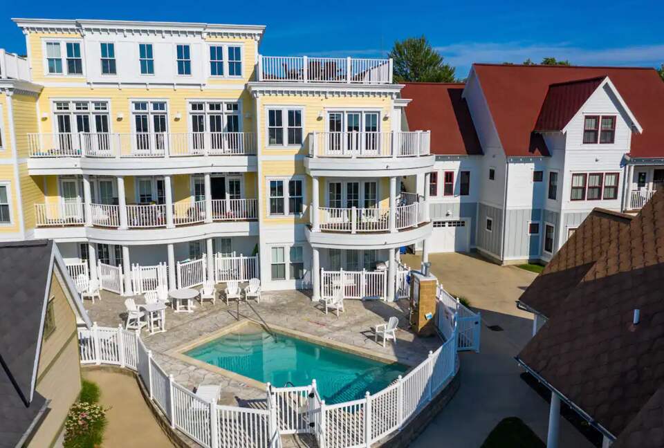 Home Exchange in Grand Haven, MI back of home communal pool