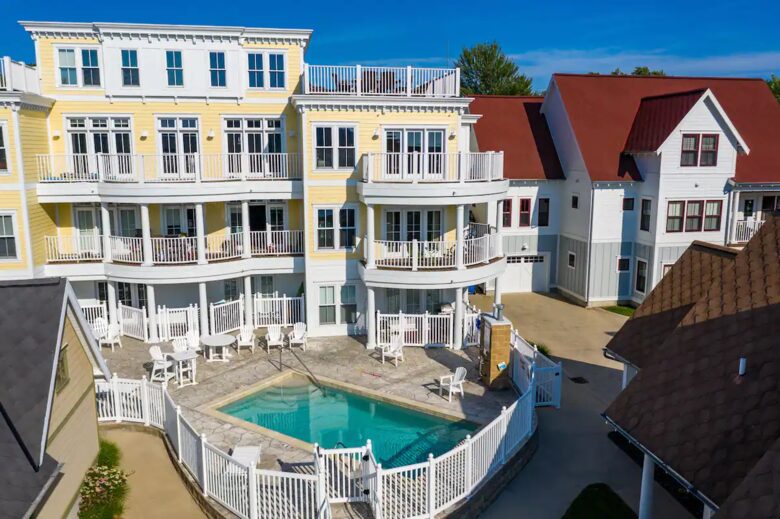 Home Exchange in Grand Haven, MI back of home communal pool