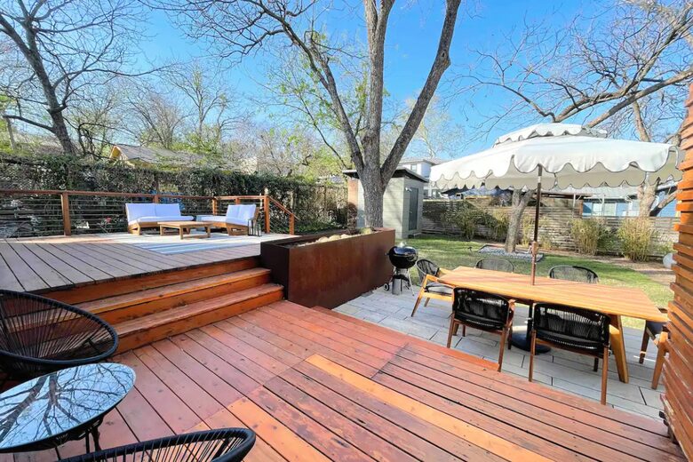 Back patio with grill, dining, and lounge