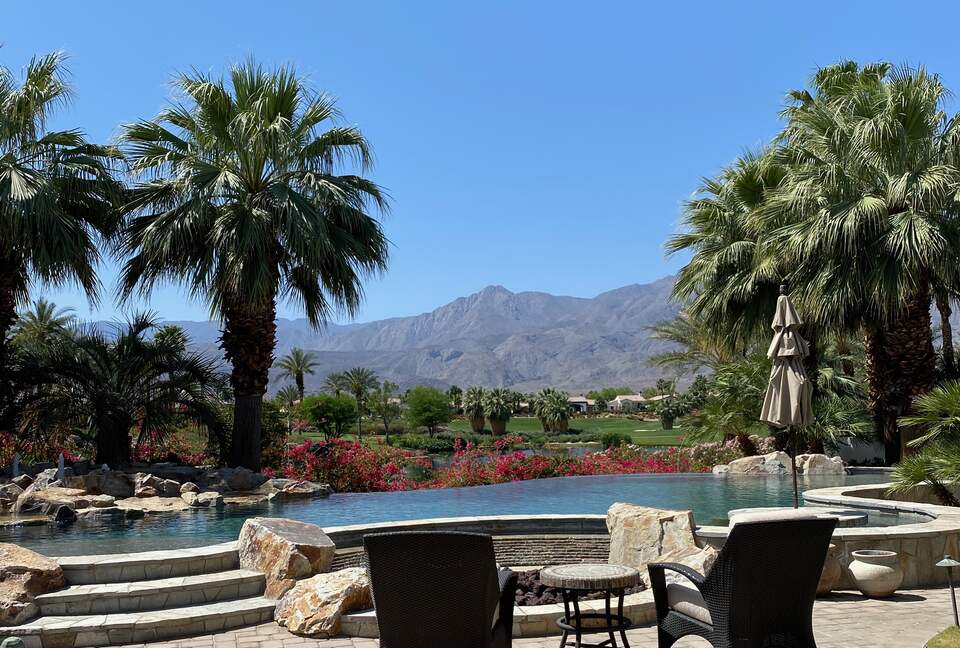 Home Exchange in La Quinta, CA Mountain and course view over the pool