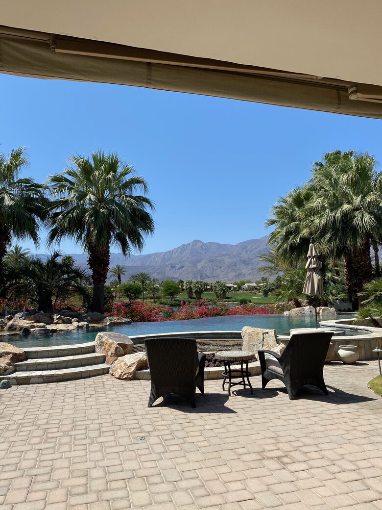Home Exchange in La Quinta, CA Mountain and course view over the pool