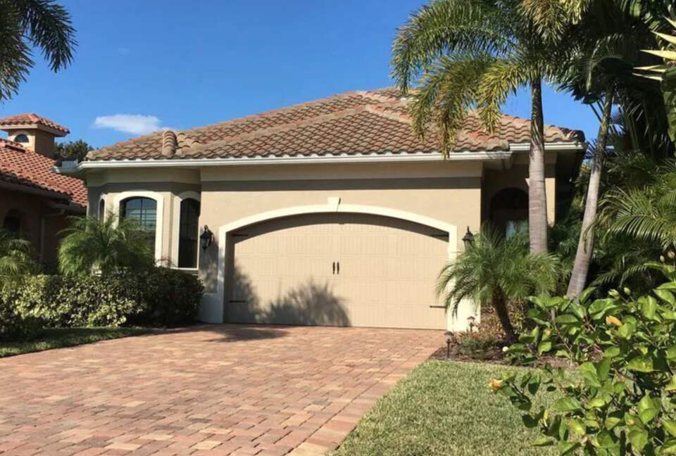 Naples Whispering Palms