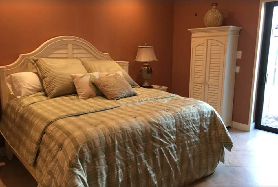 Master bedroom with sliding doors to pool