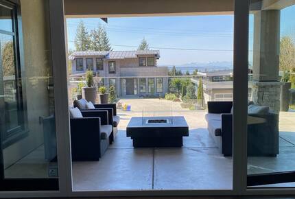 Home Exchange in Vancouver, BC, Canada fire pit with water views
