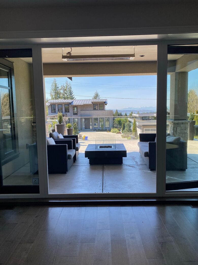 Home Exchange in Vancouver, BC, Canada fire pit with water views